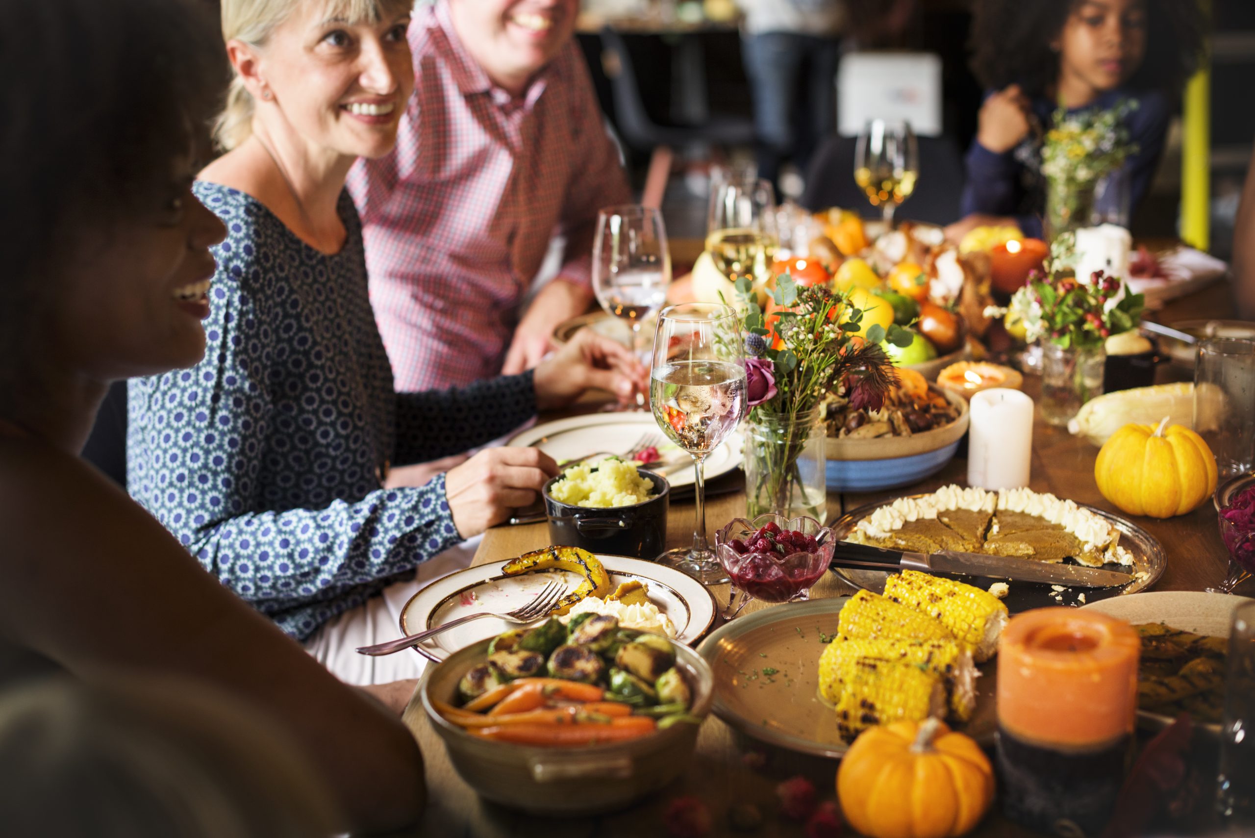 People Celebrating Thanksgiving Holiday Tradition Concept